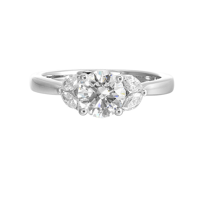 Create timeless romance with round solitaire engagement ring held between symmetrical marquise petals.