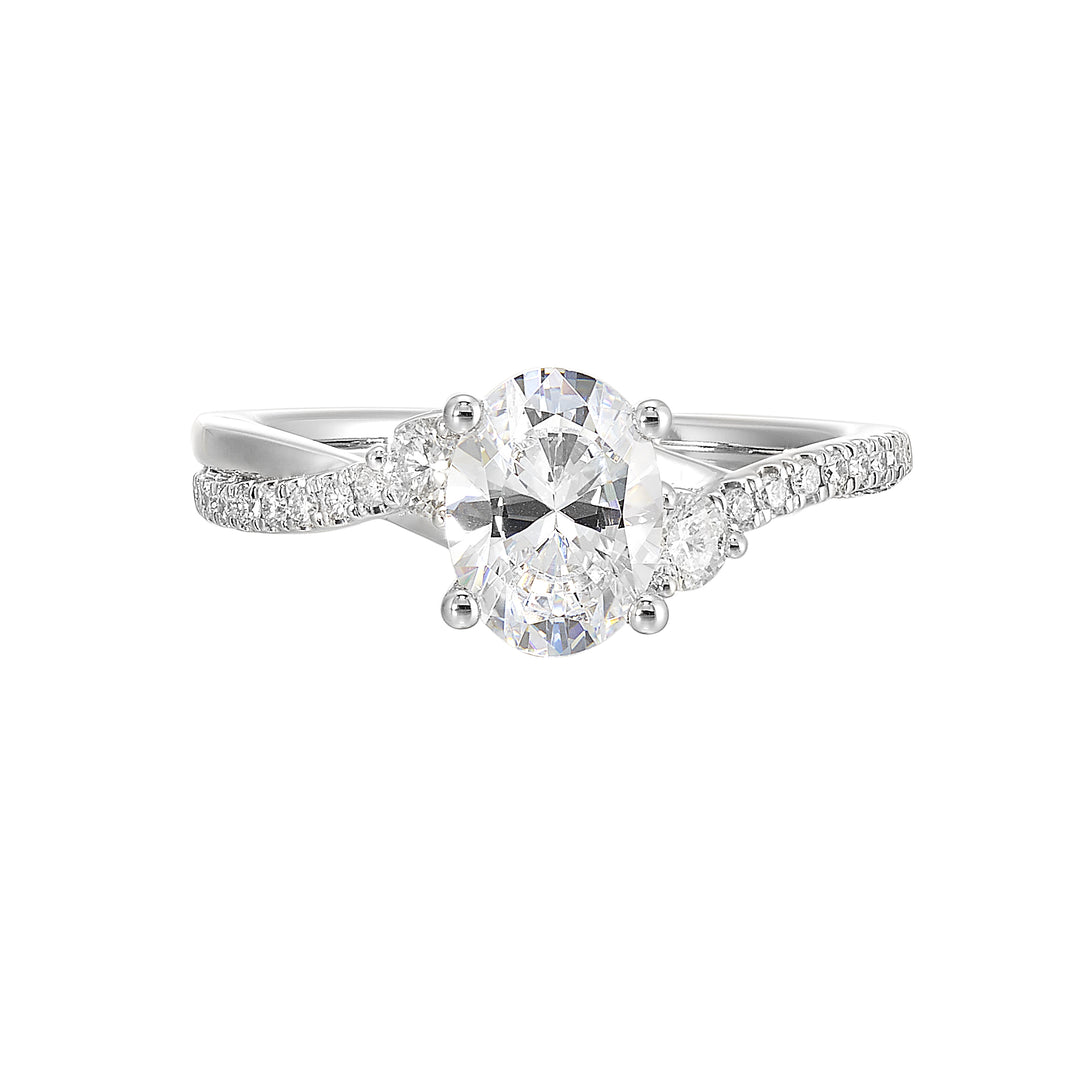 Glamorous three stone ring features curving bands with sparkling pave diamonds and metal forming a captivating details in front.