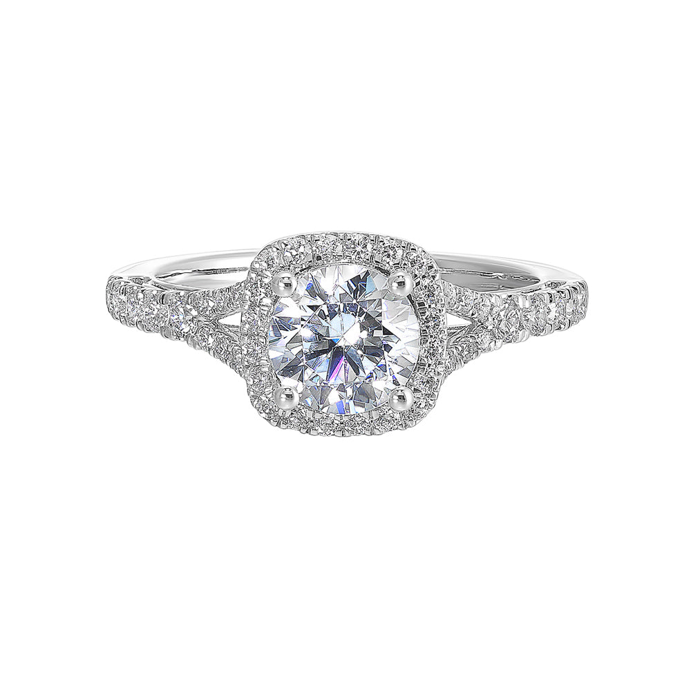 A softened cushion halo of diamonds surrounds the center solitaire with front details.Pave split shank adds a stylish, dazzling look.