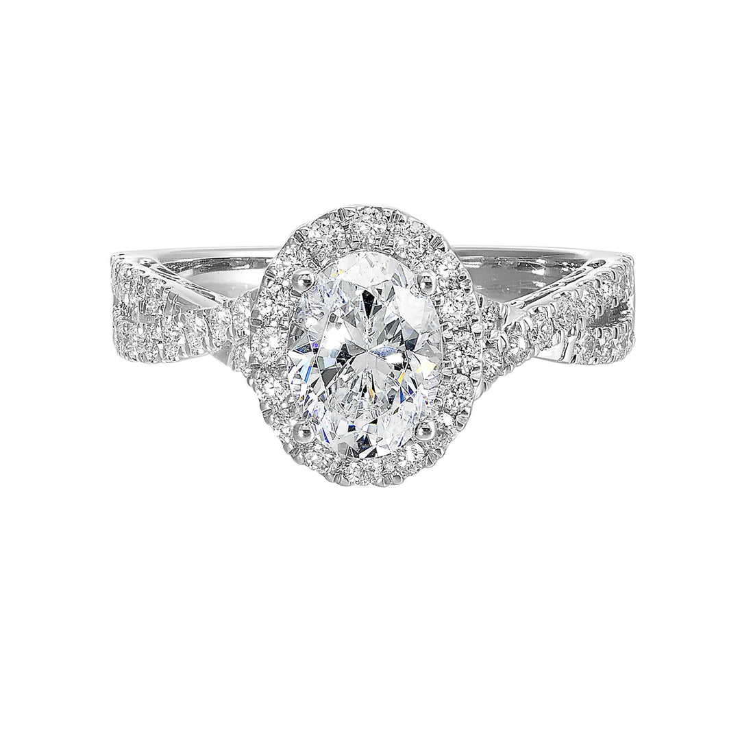 Shimmers of entwined shank with a classic halo and round center diamond is sure to delight you.