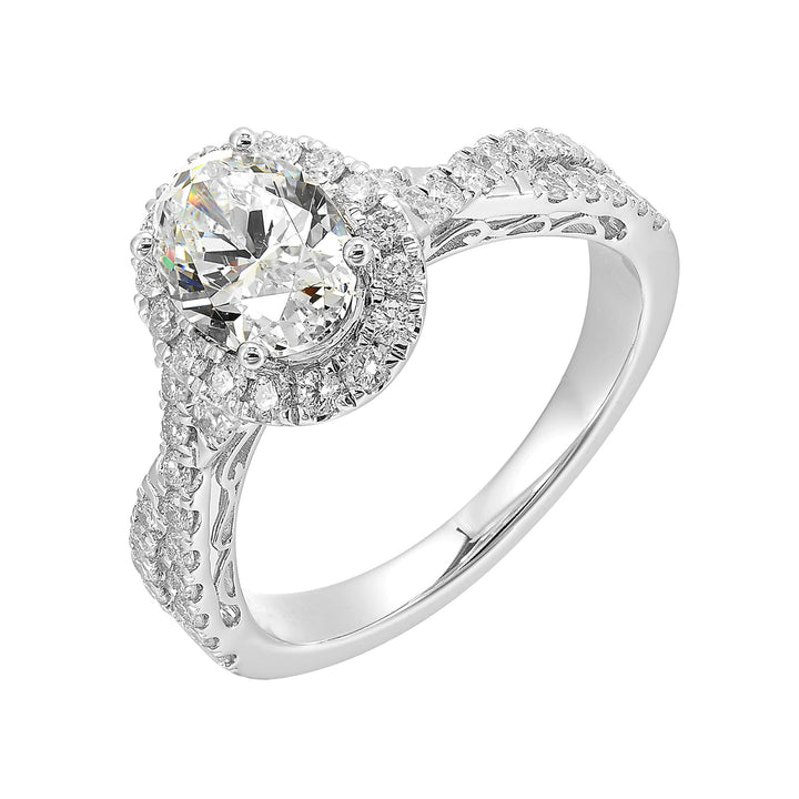 Shimmers of entwined shank with a classic halo and round center diamond is sure to delight you.