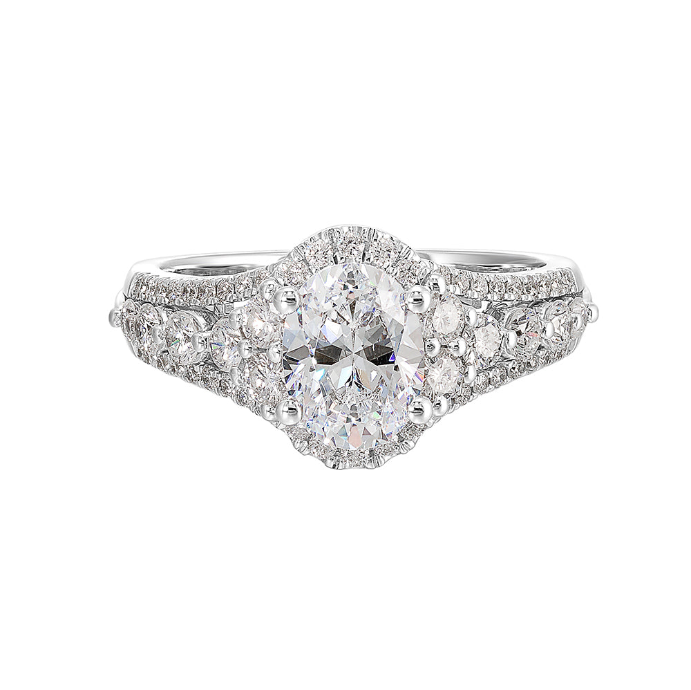 A gorgeous engagement ring featuring three rows of diamonds with bigger diamonds in center and smaller diamonds on the sides gives stunning look.