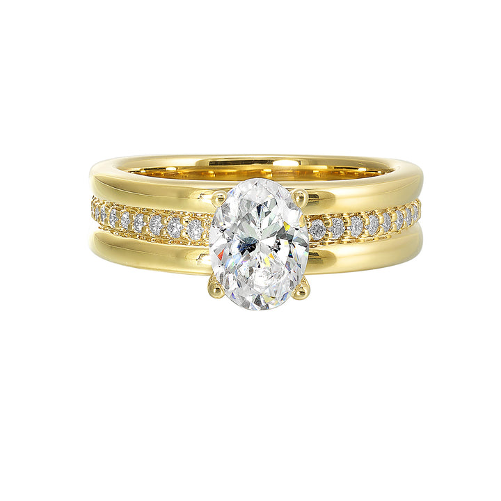 Impress the love of your life with this broad band ring. It features round diamonds set in center framed by a twin border of metal further highlighted with the oval center.