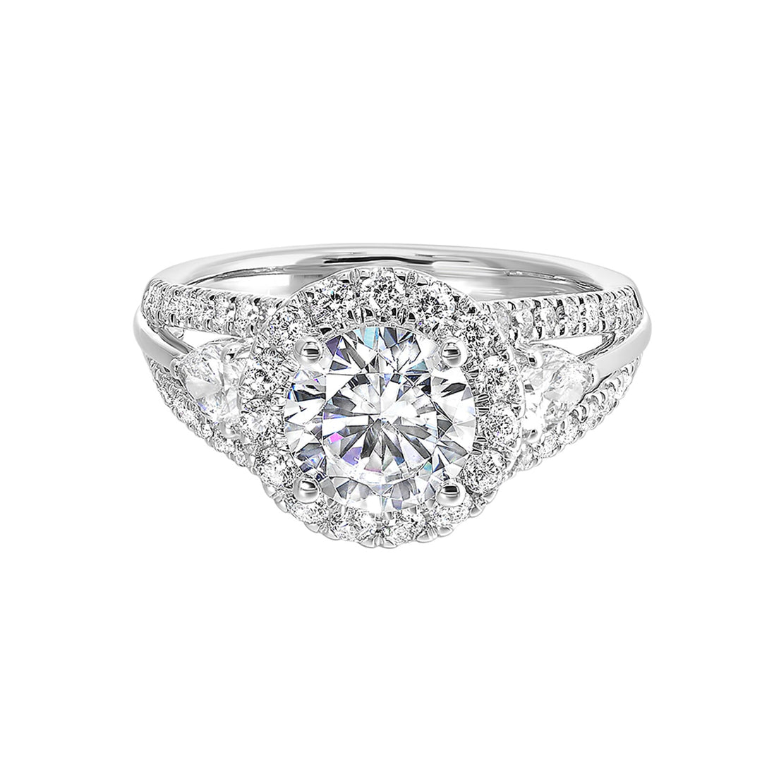 Start your love story with sparkles of this marquise and round diamond three stone engagement ring. The three rows shank have a beautiful split with pave studded diamonds on the sides.