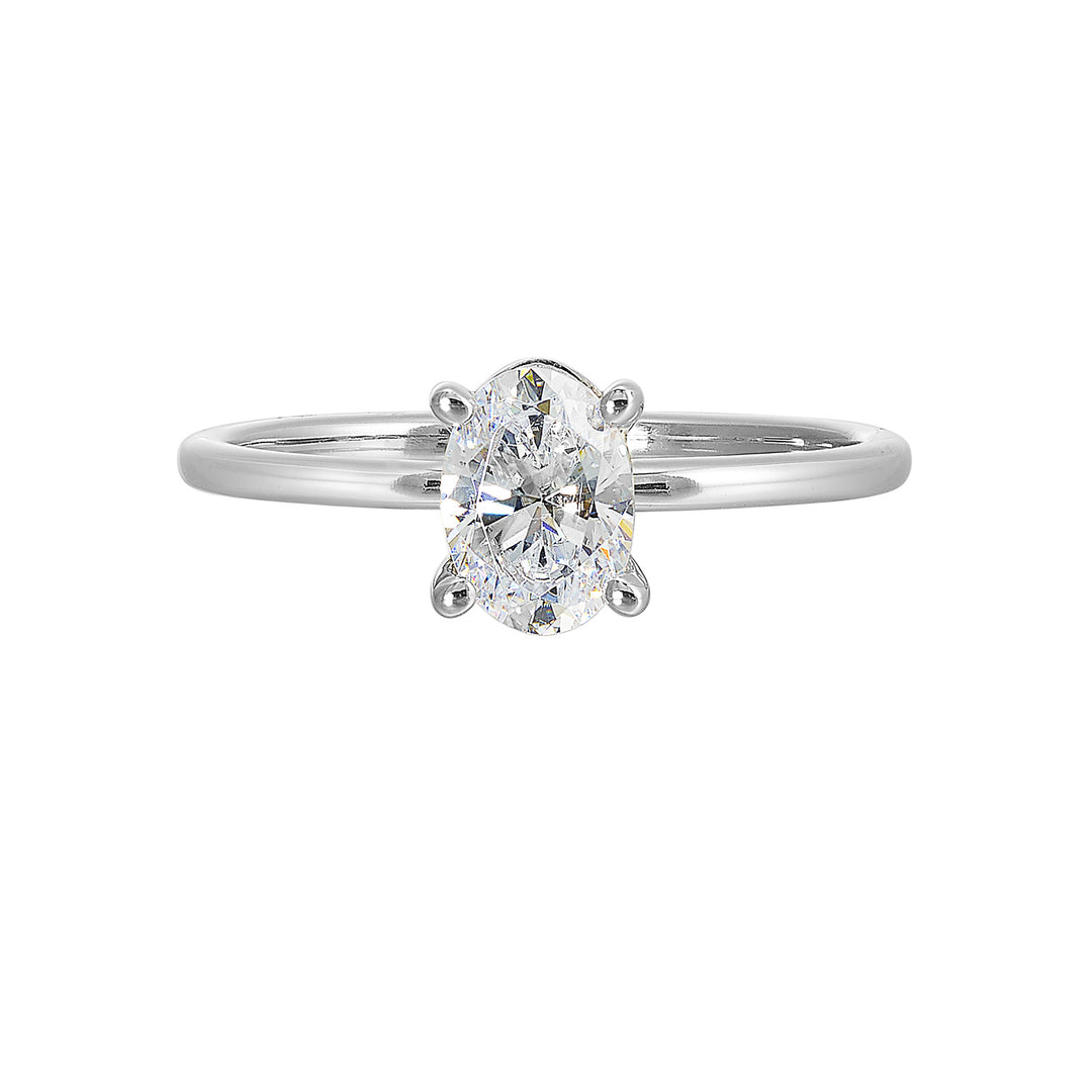 This delightful engagement ring features classic four prong oval solitaire engagement ring. The petite band adds to the sleek, classic look of this ring.