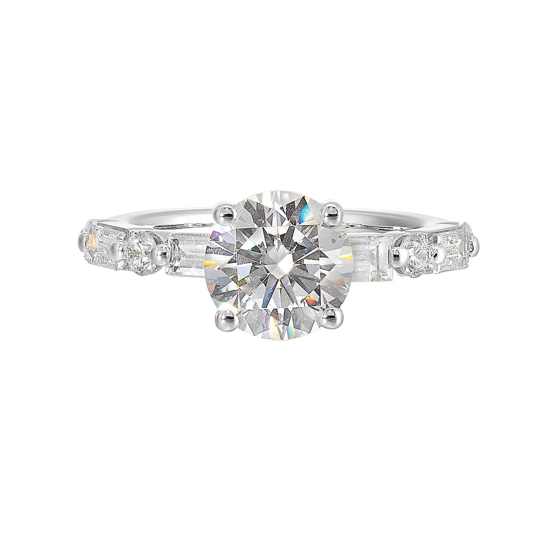 Baguettes and round diamonds spell contemporary elegance along this solitaire engagement ring.