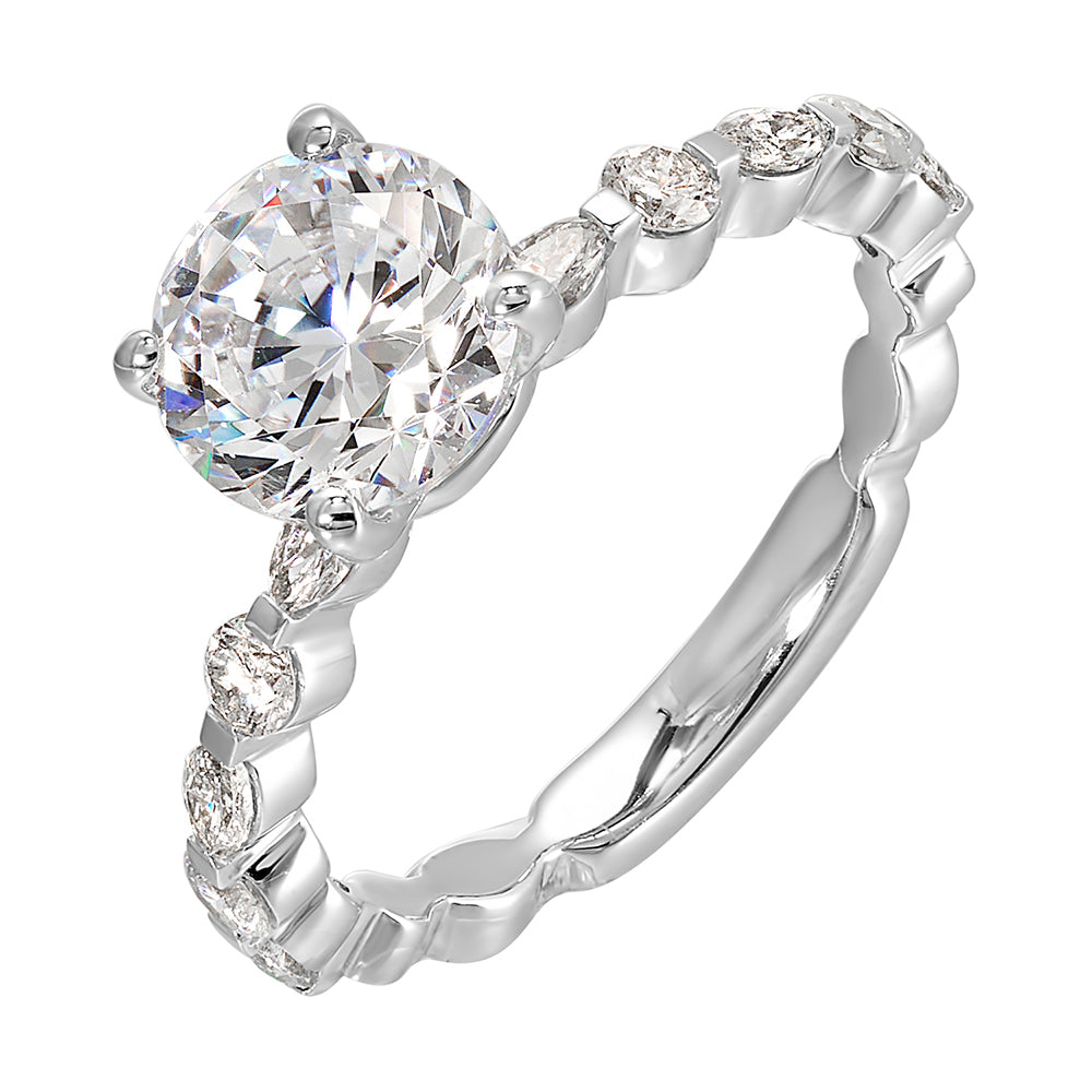 You are sure to cause a sensation with marqusie and round diamonds engagement ring highlighting the center solitaire.