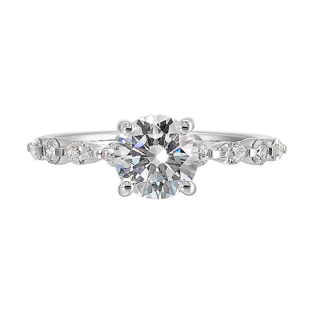 Treasure the special moment forever with marquise and round shape diamond in this sparkling round center engagement ring.