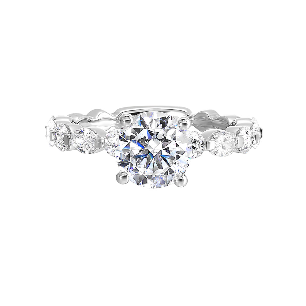 The Marquise and round diamond shank are a modern take on a classic look adding elegance and excitement to your look with bigger center diamond.