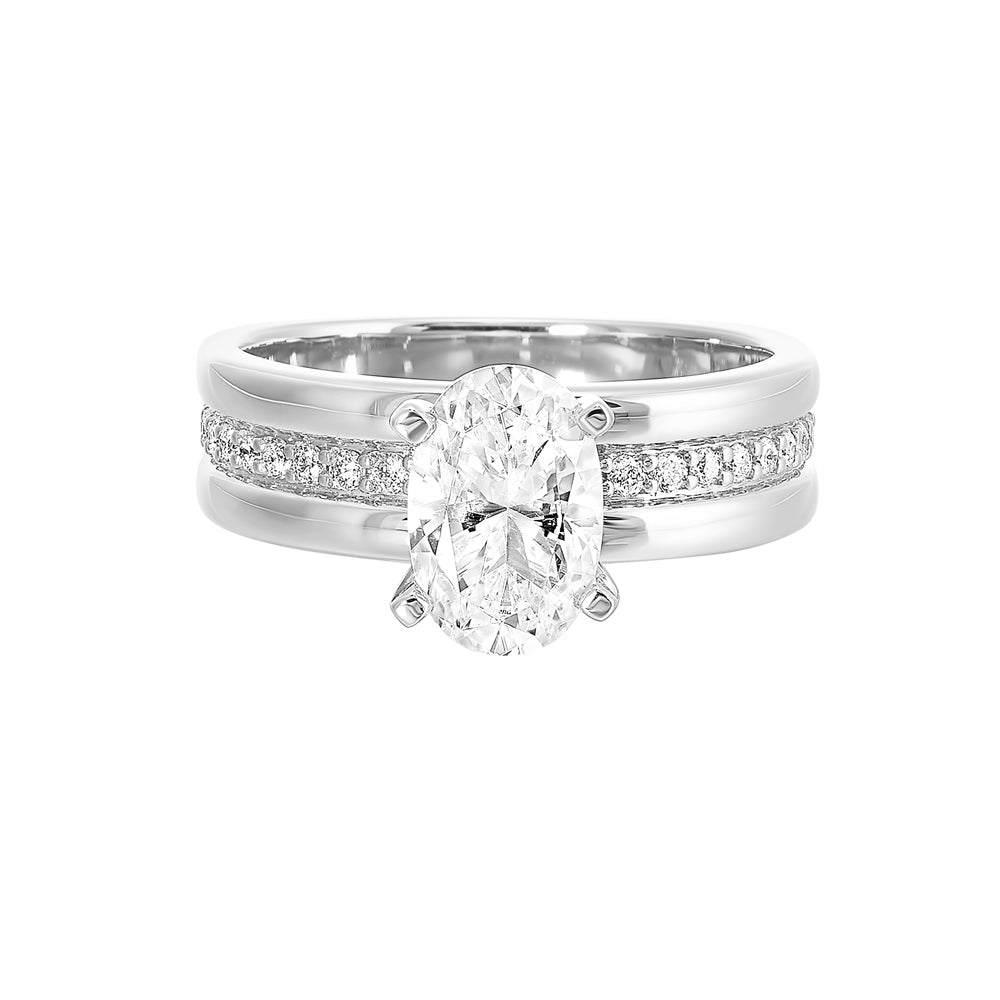 Make a luxurious presence with bold wide engagement ring. This modern engagement ring with oval center features a thick band with studded diamonds in center that makes an eye-catching statement .