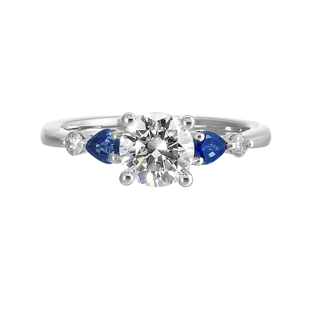 Colourful celebration! This five stone ring features round solitaire diamonds followed by pear shape colorstone and a round diamond at the end,  offers a touch of color to your personality.