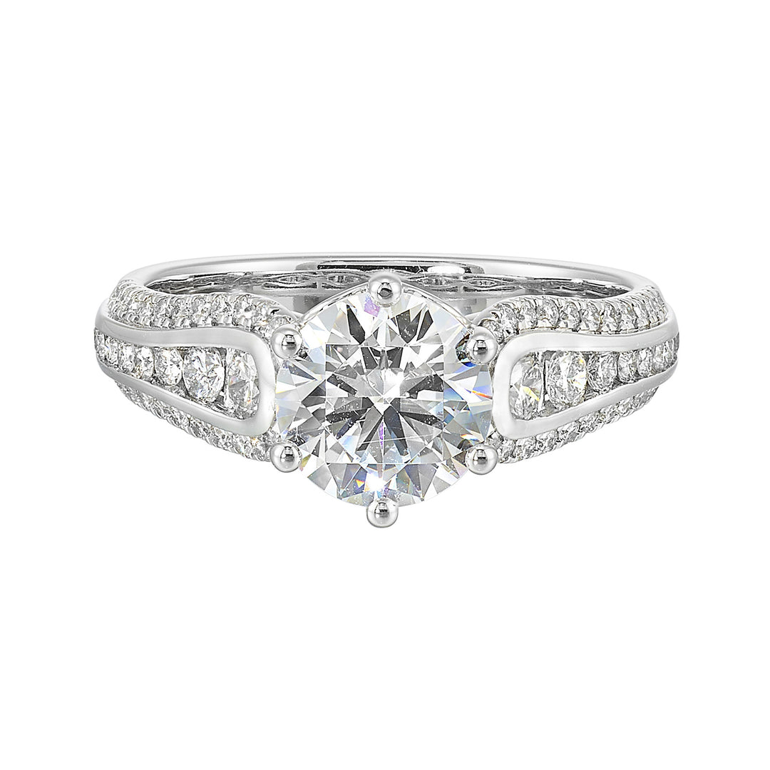 Stunning solitaire ring set in 6 prongs is a dazzling display of channel set diamonds in the center & pave on sides making the ring more appealing.