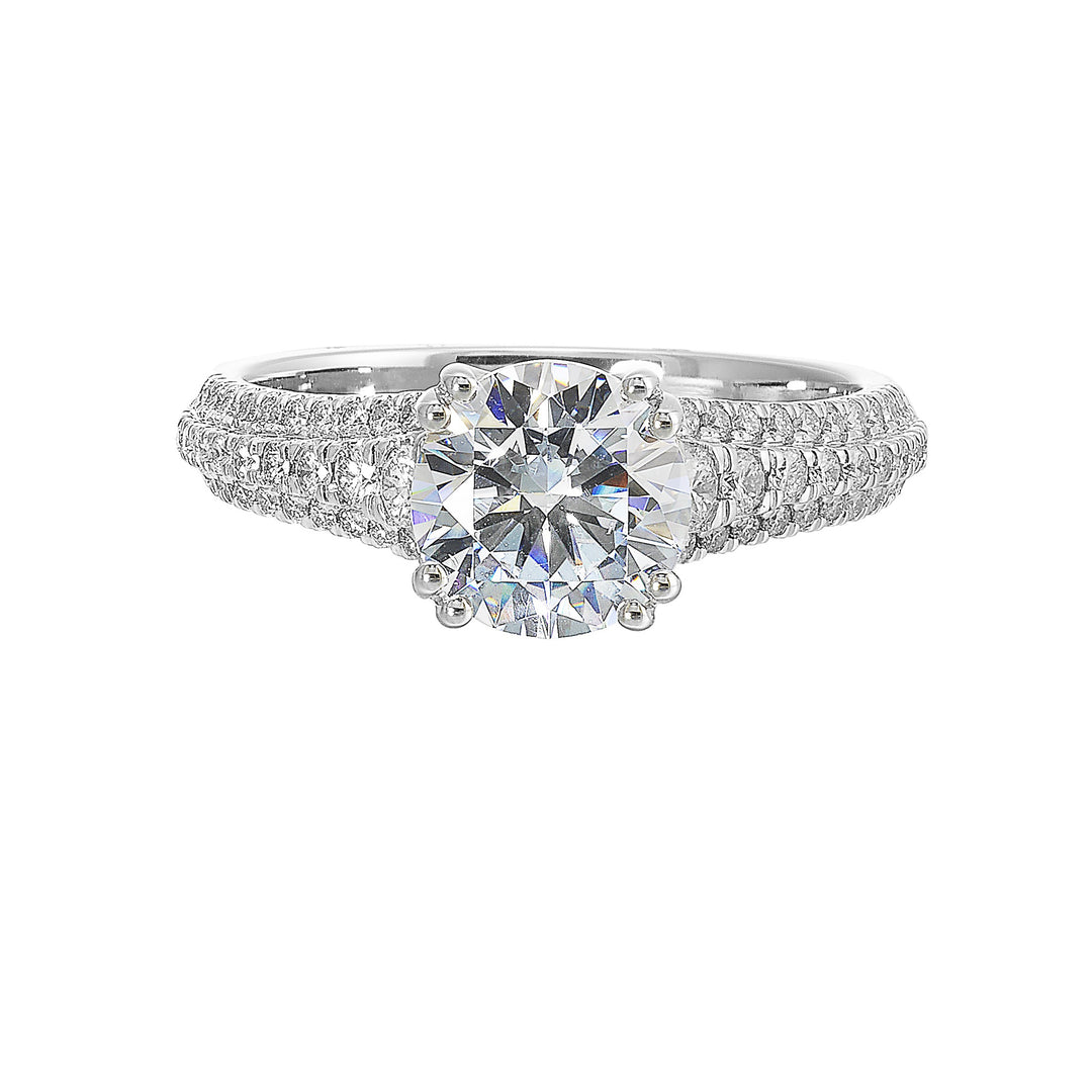 Three rows of micro pave diamonds tappering at the bottom adorns the shank highlighting the center diamond beautifully.