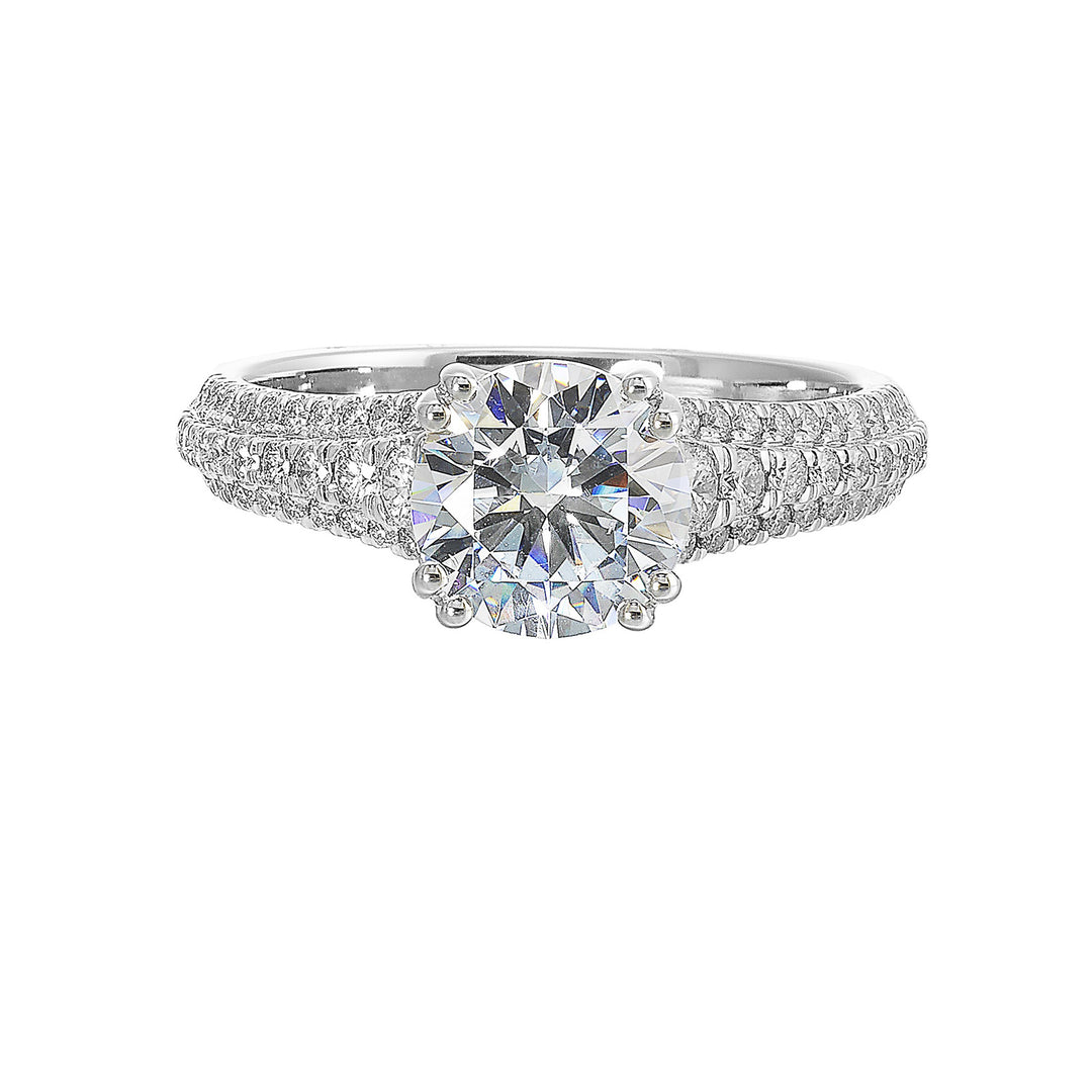 Three rows of micro pave diamonds tappering at the bottom adorns the shank highlighting the center diamond beautifully.