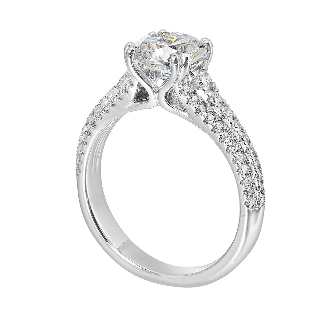 Three rows of micro pave diamonds tappering at the bottom adorns the shank highlighting the center diamond beautifully.