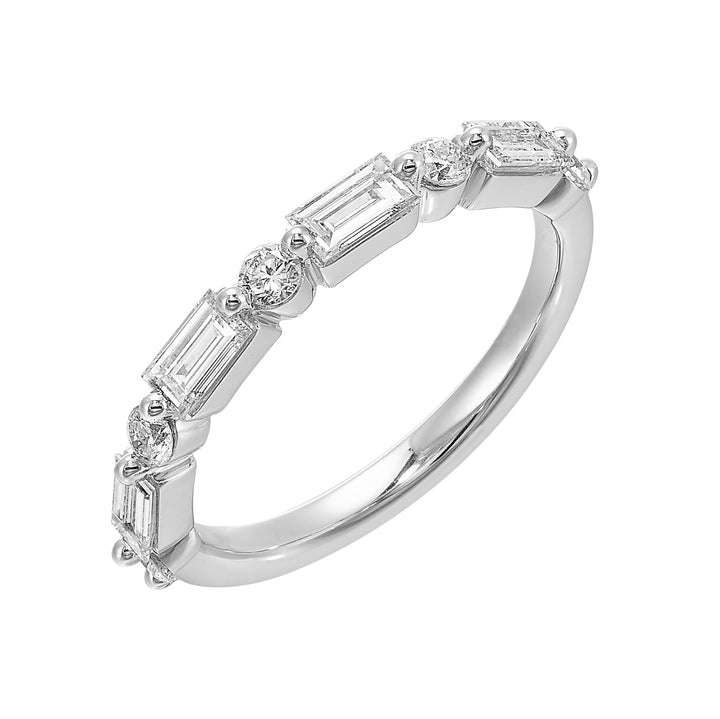 The alternating pattern of round and baguette diamonds creates a harmonious contrast. Looks beautiful when paired with other rings.