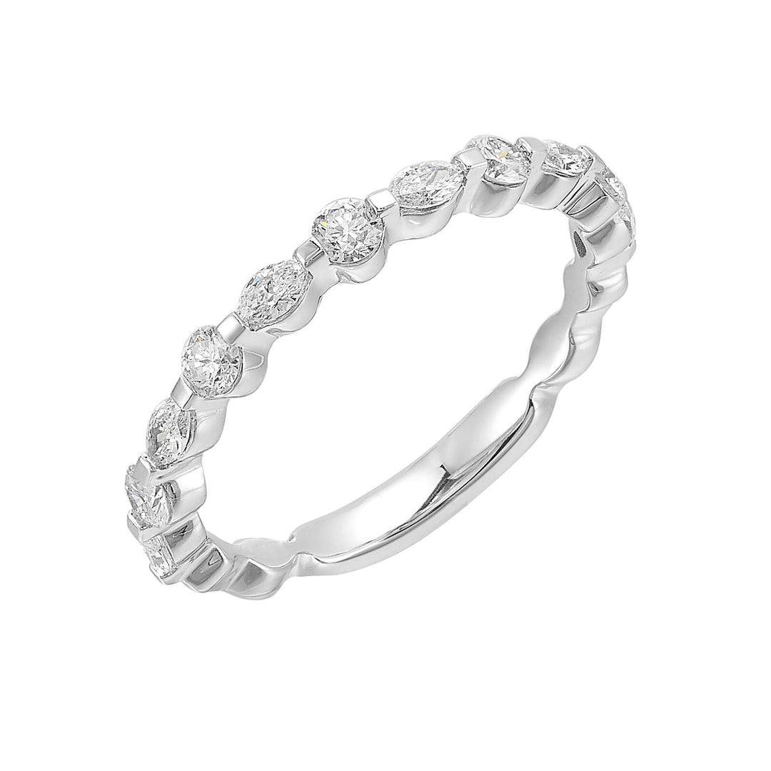 Sparkling marquise and round diamonds dance in harmony on this delicate band, creating a unique and captivating sparkle with comfort fit inside.