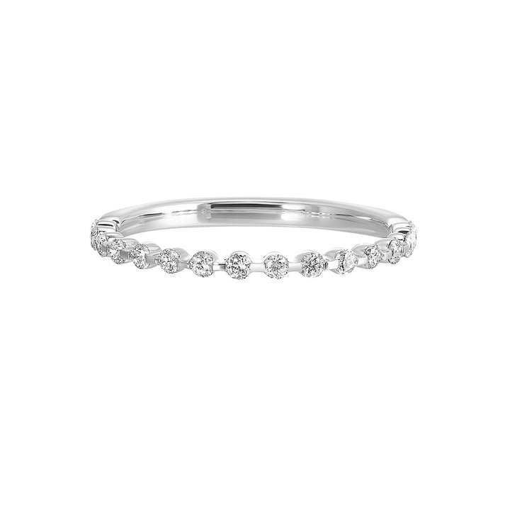 Dazzling round diamond captivates on a delicate band, enhanced by a single prong setting set half way around the band.